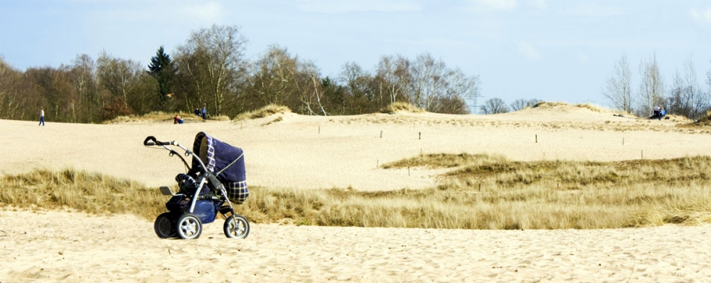 Lone Pram on Beach